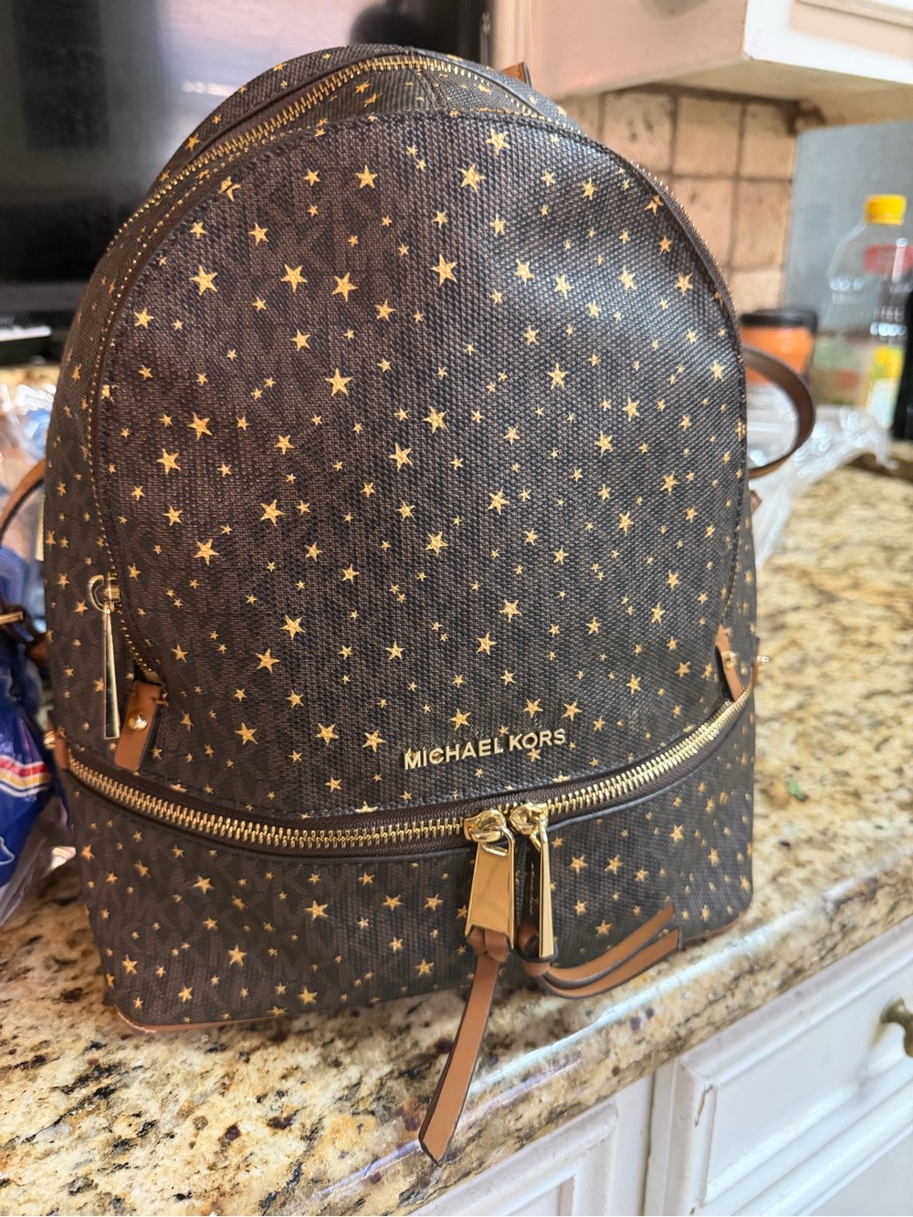 Michael Kors Black Backpack with Gold Star Print